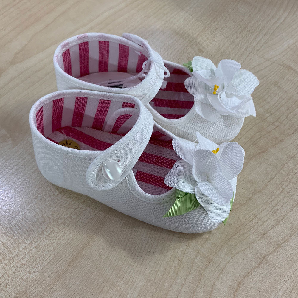 Scarpines de la ligne vêtements enfant Ambarabà, en matériaux très doux et avec un travail artisa...