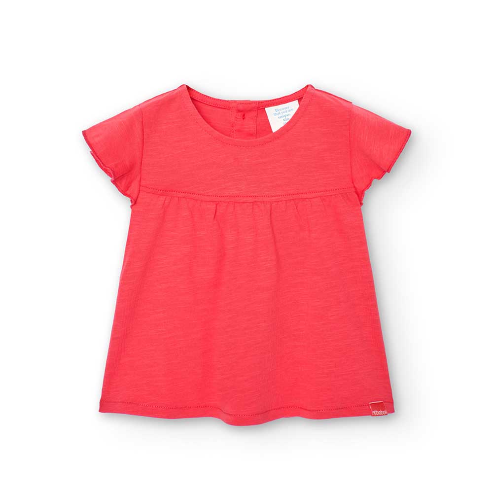 T-shirt from the Boboli Girls' Clothing Line, with rouge on the shoulder straps and small buttons...