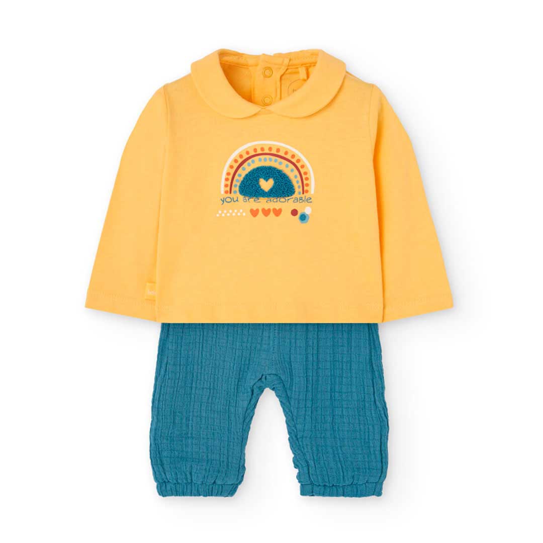 Complete two-piece outfit from the Boboli Girls' Clothing Line, with gauze pants and a solid colo...