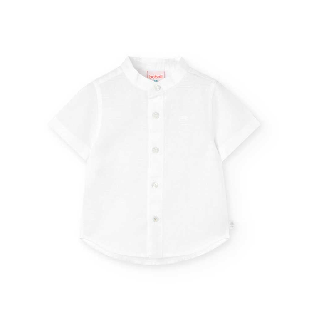 Camisa en lino de la Línea de Ropa Infantil Boboli, de manga corta con cuello mao.

Composición: ...