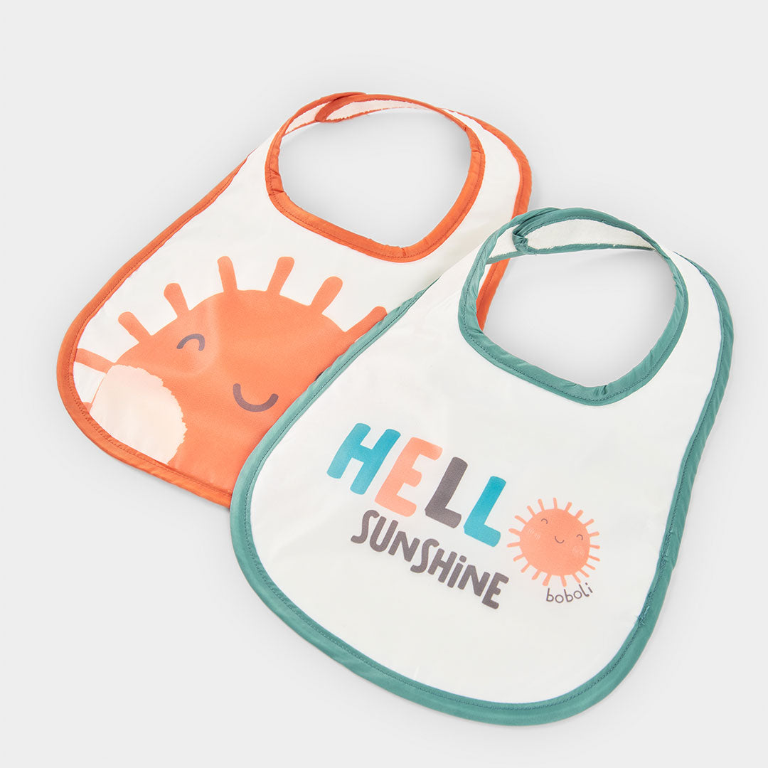 Set of two bibs from the Children's Clothing Line Boboli with colorful animal prints in the cente...