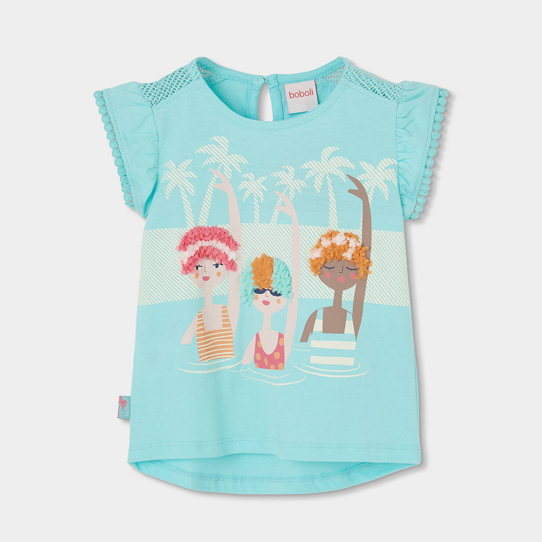T-shirt della Linea Abbigliamento Bambina Boboli, più lunga sul dietro, con risvoltini sulle mani...