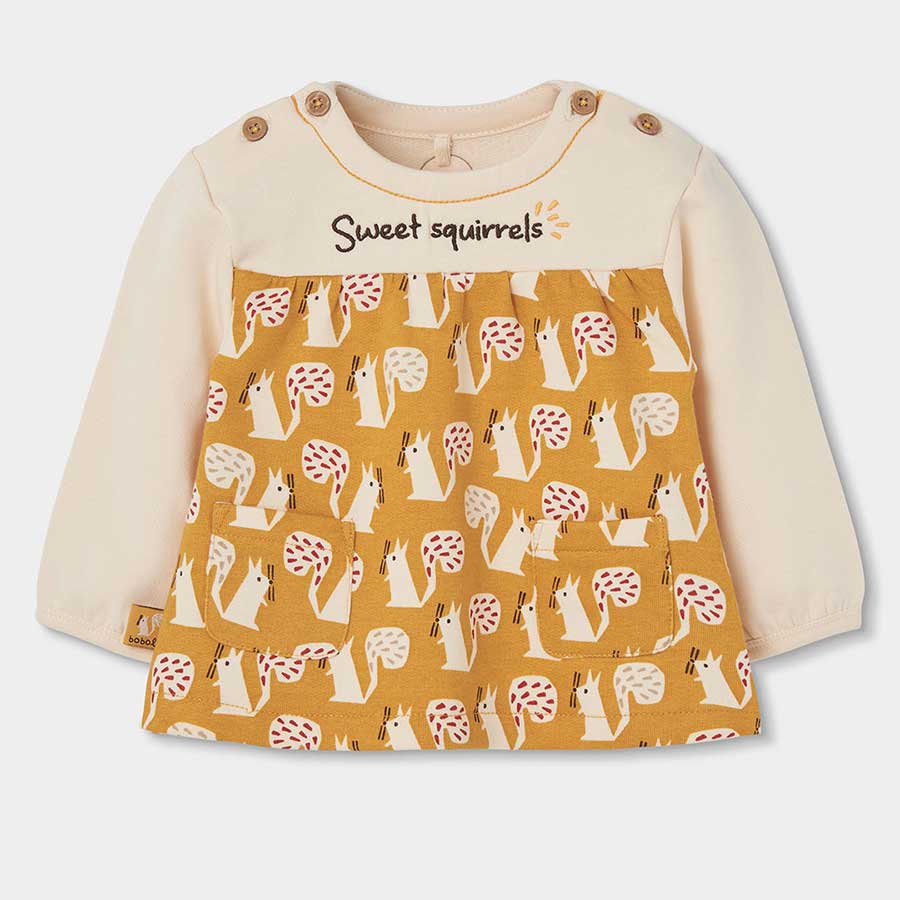Enveloppez votre petite fille dans un cocon de douceur et d'élégance avec cette adorable robe en ...