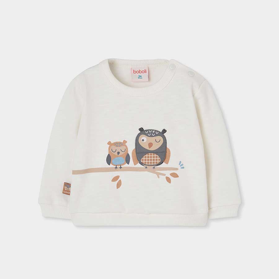Idéale pour garder les tout-petits au chaud pendant les journées froides, ce sweat-shirt allie do...