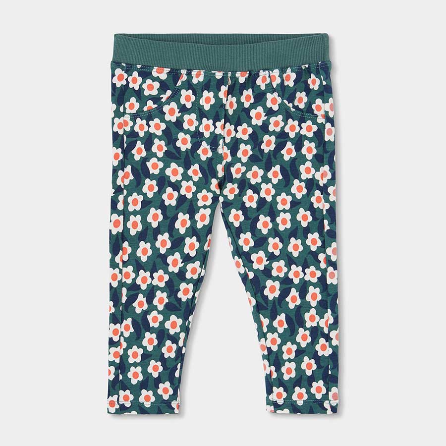 Ce pantalon en molleton à motif floral apporte gaieté et confort à votre petite fille pendant les...