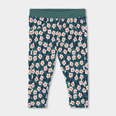 Pantaloni felpati con stampa di fiori bianchi e arancio su fondo verde scuro con fascia elastica verde