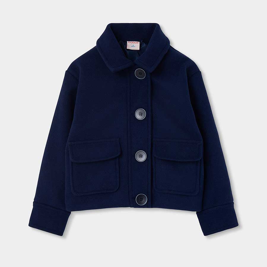 Cette veste courte à poches est parfaite pour accompagner vos petites filles lors des journées fr...