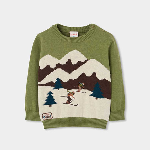 Maglione verde oliva con motivo montagna innevata e sciatori per bambino