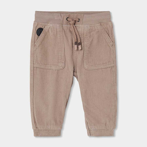 Pantaloni in velluto beige con tasche frontali e coulisse in vita per bambino