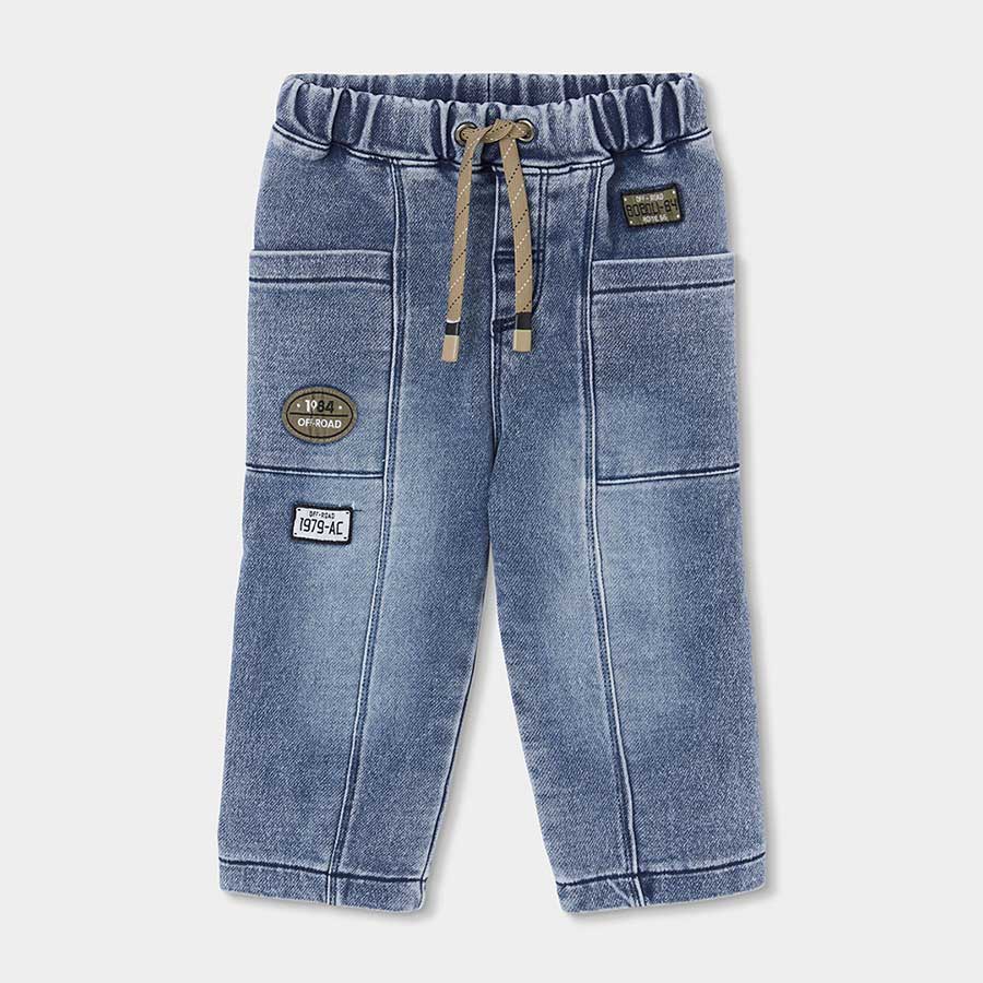 Ce pantalon en jean au délavage clair est idéal pour accompagner votre enfant lors des journées f...