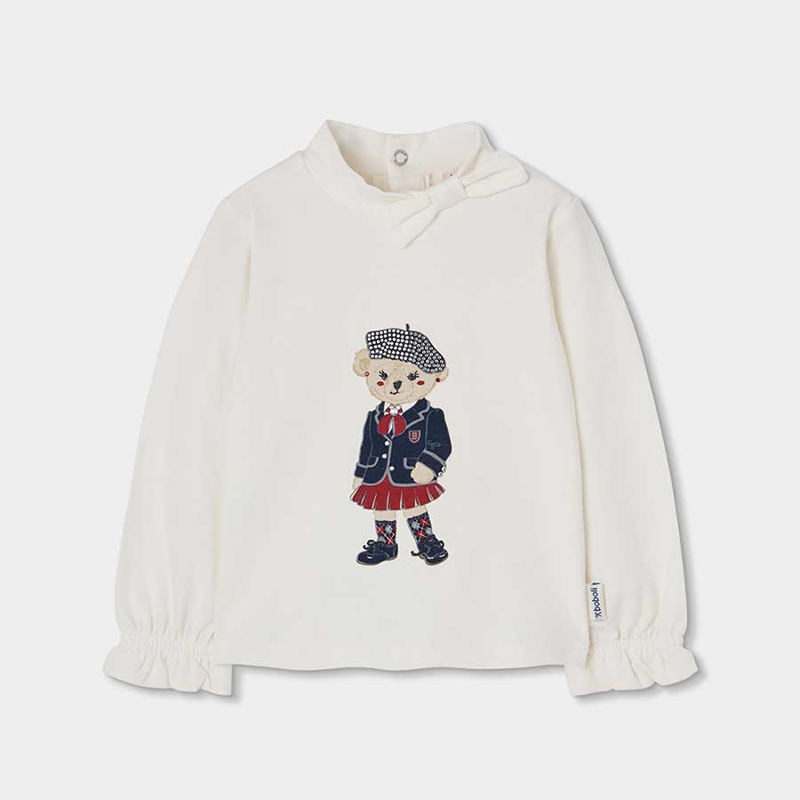 Découvrez ce pull à manches longues au design doux et raffiné, idéal pour les journées fraîches d...