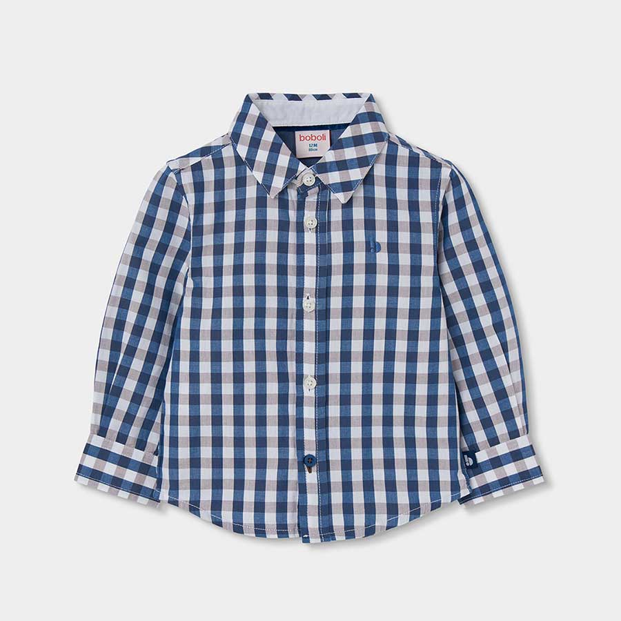 Cette chemise à carreaux est parfaite pour les petits explorateurs qui recherchent un look soigné...