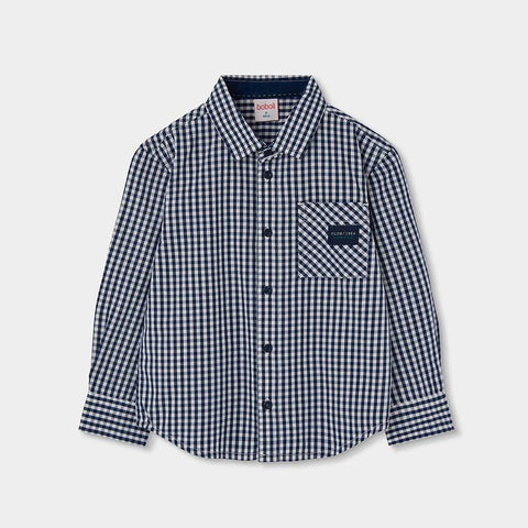 Camicia a quadri blu e bianca con taschino sul petto e bottoni blu, maniche lunghe