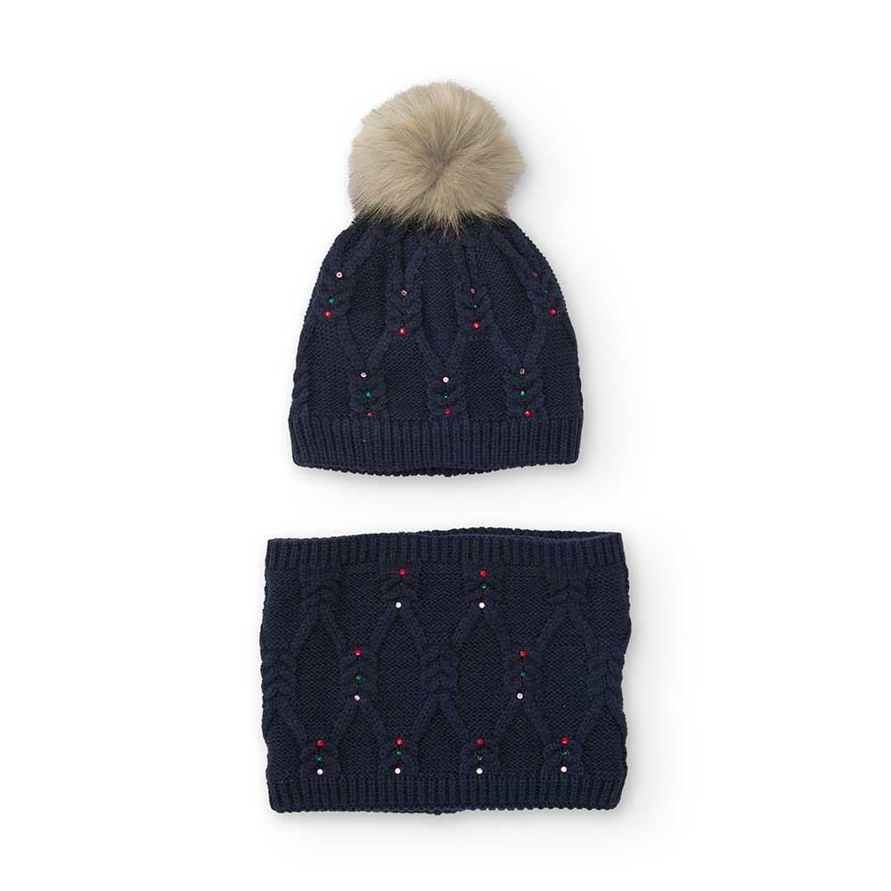 Set from the Nath Kids girls' clothing line, consisting of a neck warmer and a hat with a pom-pom...