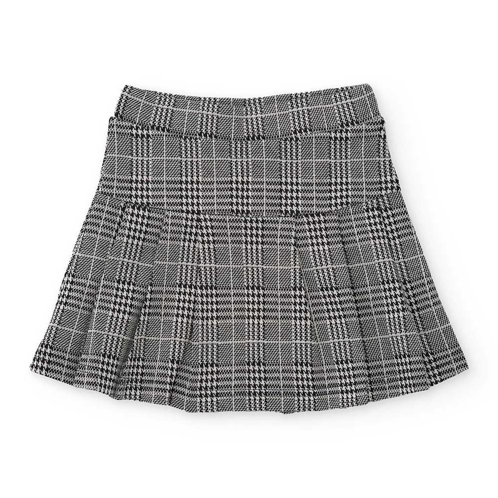 Gonna modello college della Linea Abbigliamento Bambina Nath Kids, con fantasia pied de poule.

C...