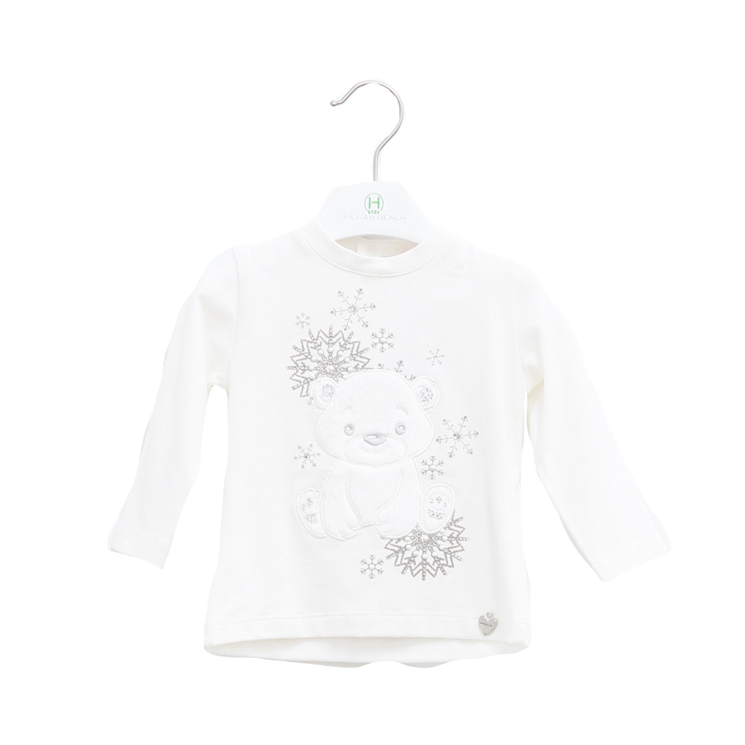 T-shirt de la ligne vêtements fille Silvian Heach Kids boutonnée dans le dos ; sur le devant, app...