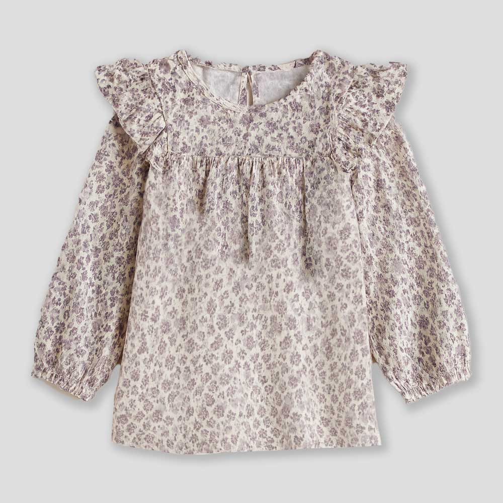 Questa camicetta a fiori è perfetta per accompagnare la tua bambina nelle dolci giornate d'autunn...