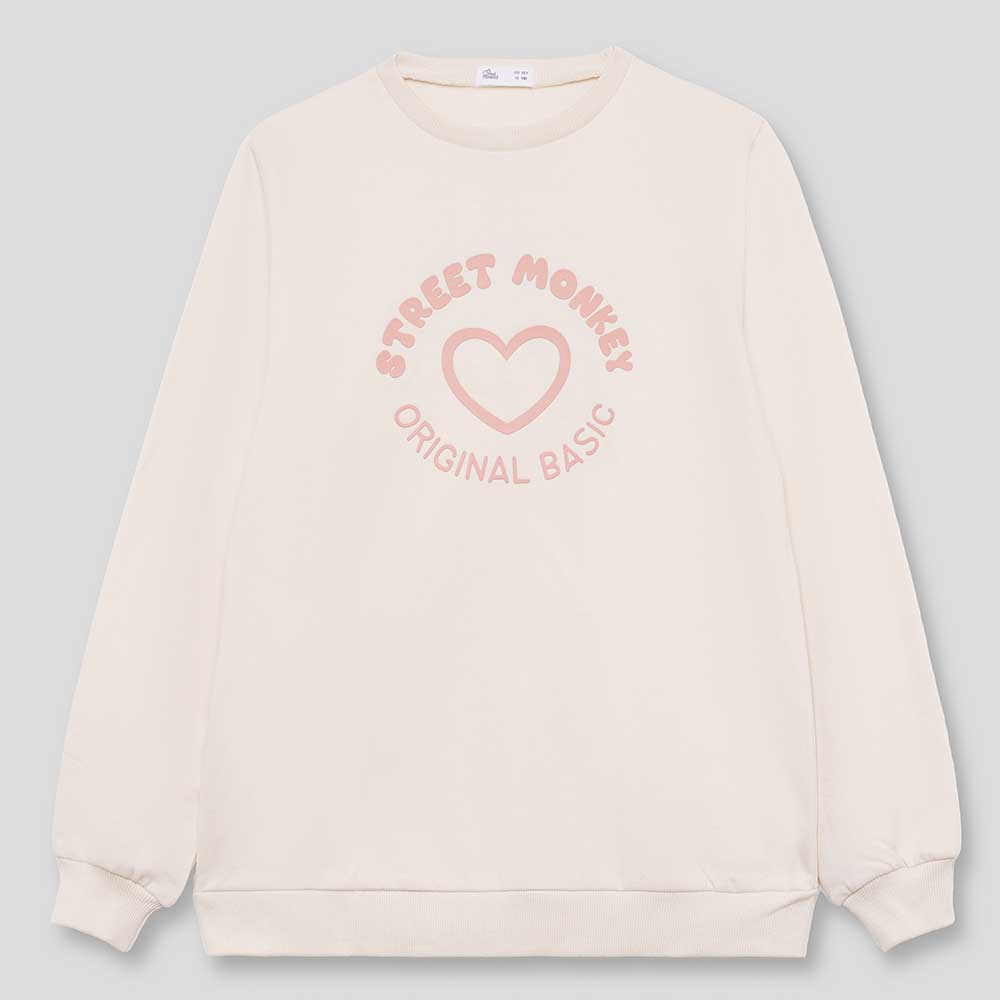 Vêtement confortable et polyvalent pour les journées plus fraîches, le sweat à col rond de Street...