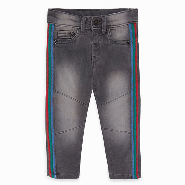 Pantalon en denim de la ligne de vêtements pour fille Tuc Tuc, avec un bas foncé et des rayures c...