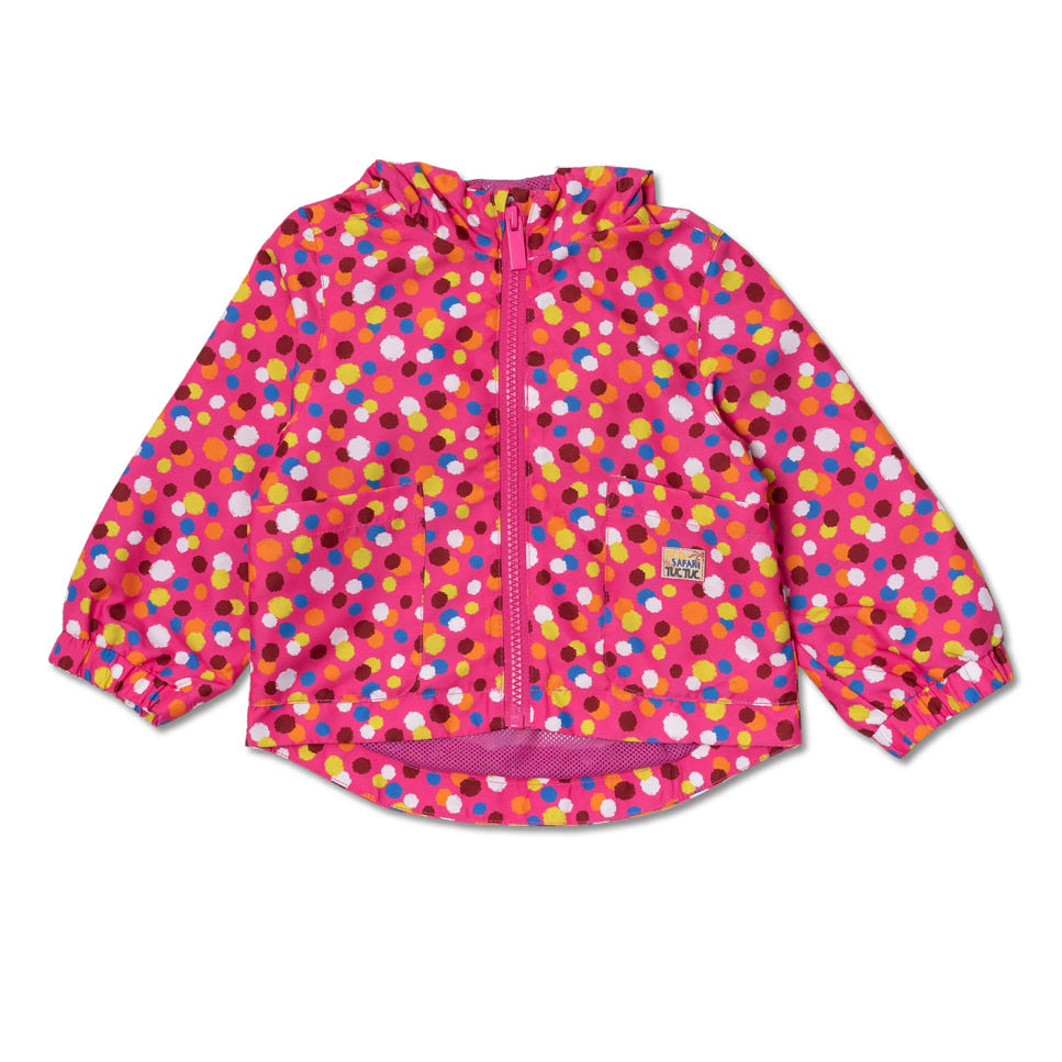 Veste coupe-vent de la Ligne Vêtements Fille Tuc Tuc, avec motif à pois colorés sur fond fuchsia....
