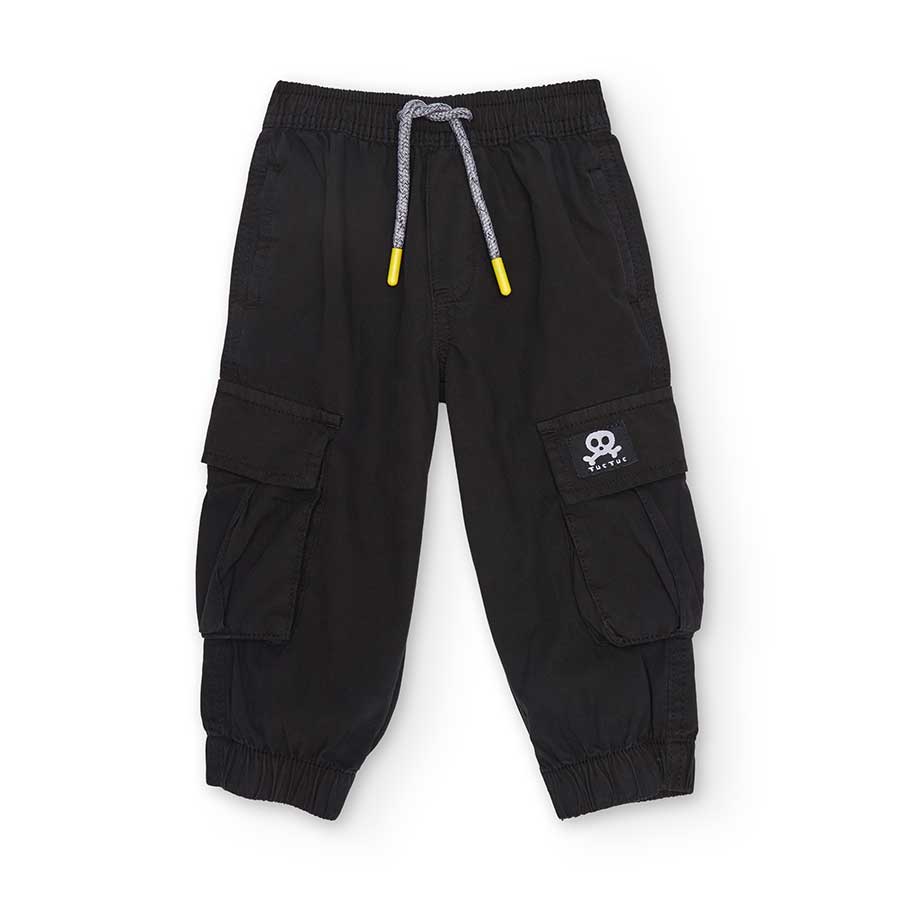 Long pants from the Tuc Tc children's clothing line, with elastic at the bottom and a drawstring ...