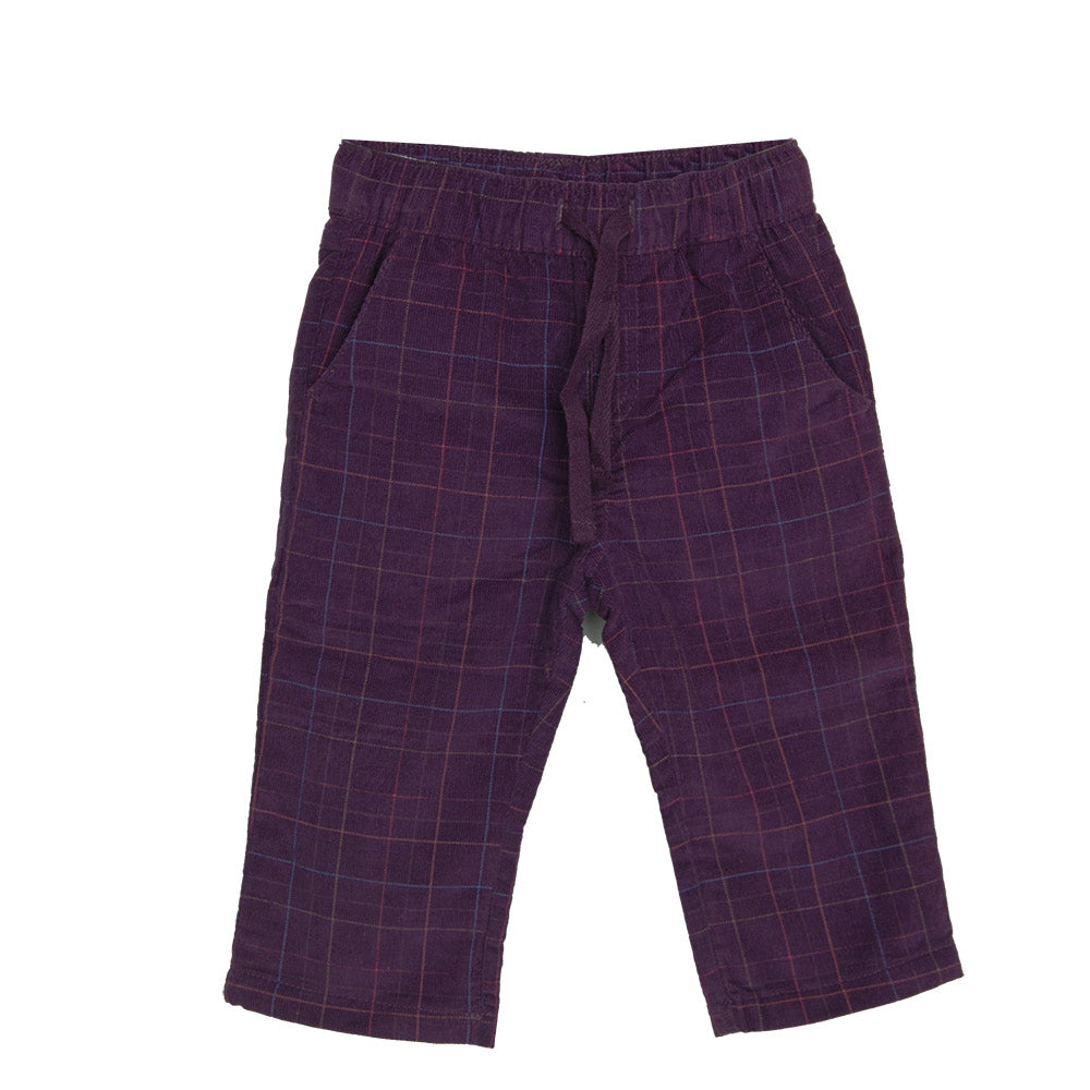 Pantalon en velours côtelé de la ligne vêtements enfant Tuc Tuc. Motif à carreaux. Poches à l'ava...