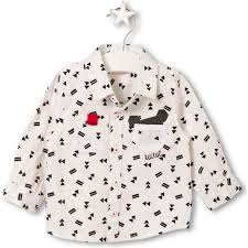 Chemise de la ligne vêtements enfant Tuc Tuc uni avec un joli motif géométrique. Petites poches à...