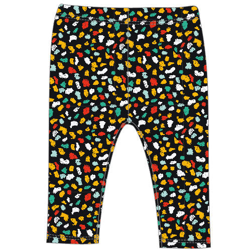 Leggings de la ligne vêtements fille Tuc Tuc, avec un motif multicolore partout, sur fond noir.

...