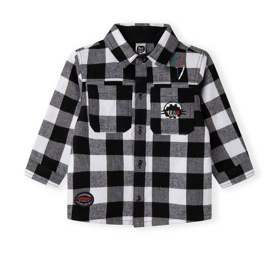 Chemise de la Ligne Vêtements Enfant Tuc Tuc, en flanelle avec motif à carreaux.
Composizione: 10...