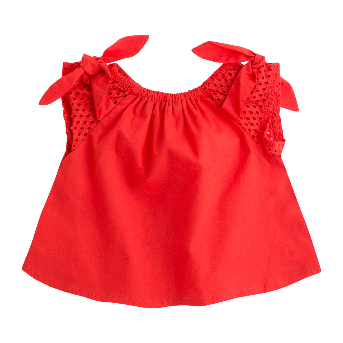 
  Top of the Canada House girl's clothing line, with perforated fabric shoulder straps
  and bows.
