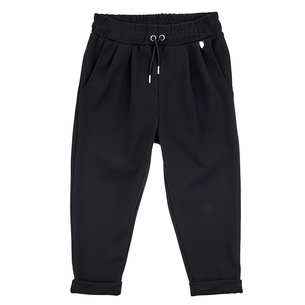 
  Trousers of the Girls' Clothing Line Fracomina, with soft and elastic model
  at the waist; li...