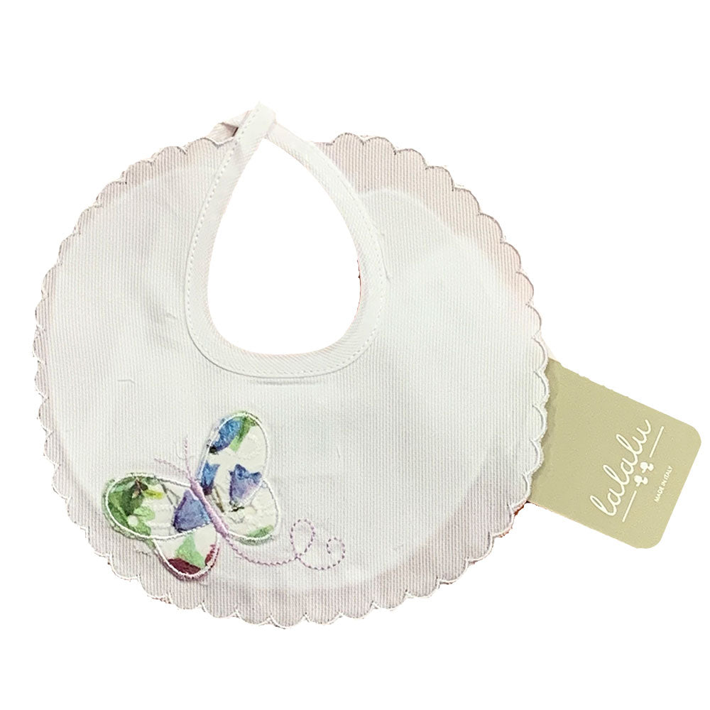 
Round bib in piqut, with scalloped edge from the Lalalù Girl's Clothing Line, with colored fabri...