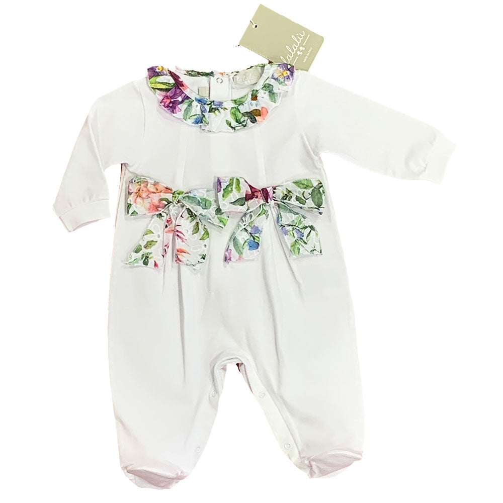 
Jersey jumpsuit from the Lalalù Girls' Clothing line, with colored lace collar and bows applied ...
