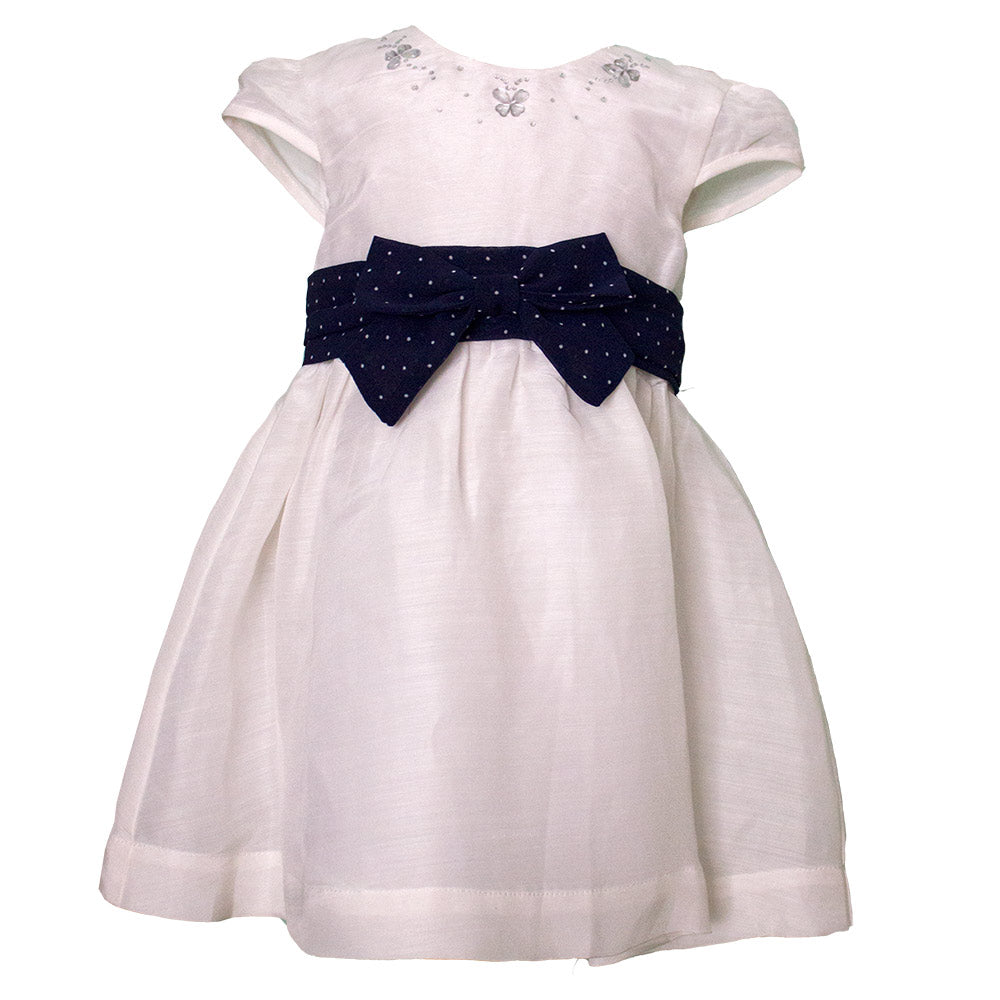 Dress from the Mirtillo children's clothing line in linen and silk. A solid unit; the neckline is...