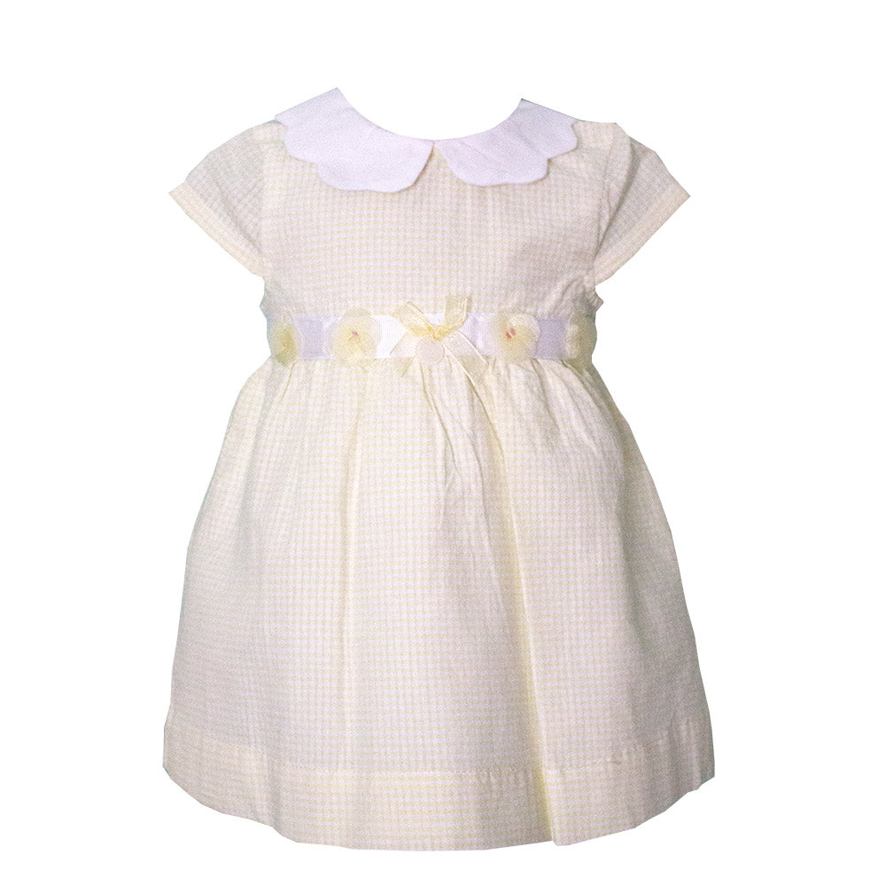 Striped popelin dress from the Mirtillo girl's clothing line. Shirt collar with wavy hem. Belt wi...