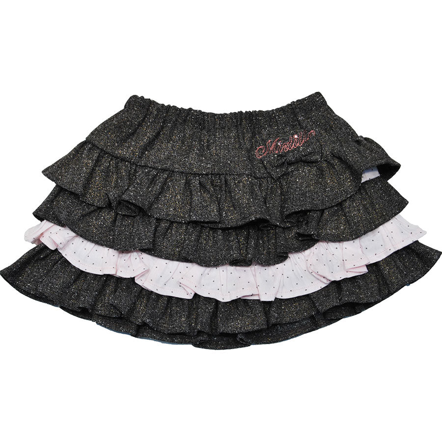 
  Tweed skirt from the Mirtillo girl's clothing line, with flounces, application of bow on the f...