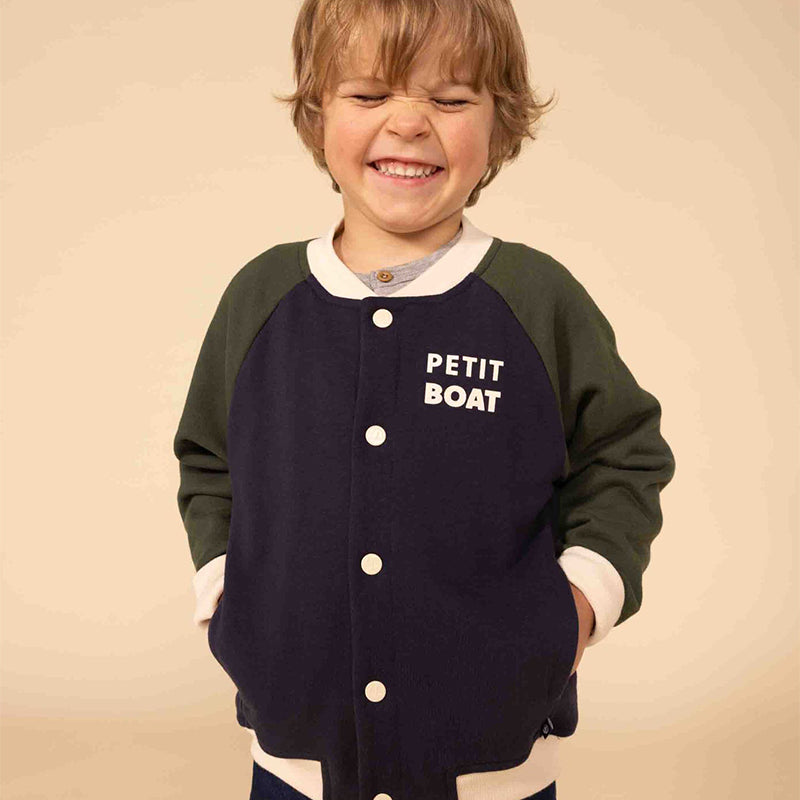 
Teddy from the Petit Bateau children's clothing line, lined to keep the child warm.
Opening with...