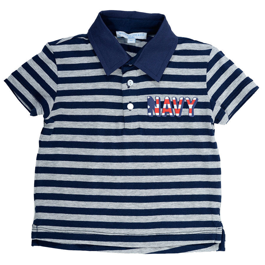 
  Short-sleeved striped polo shirt from the Silvian Heach children's clothing line. 



  Compos...