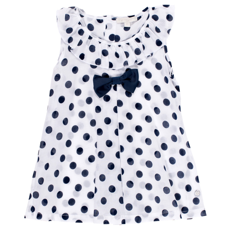 
  Blouse from the Silvian Heach Kids clothing line; blue polka dot pattern
  on a white backgrou...