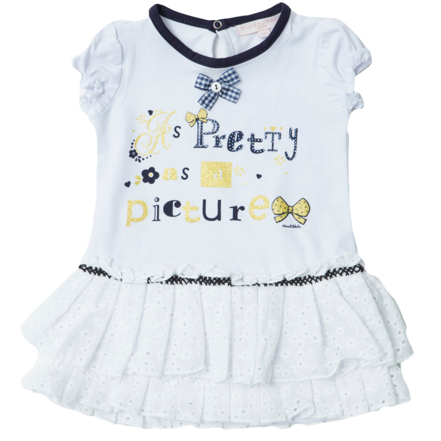 
  Little dress from the Silvian Heach Kids clothing line; puff sleeve model,
  sangallo lace flo...