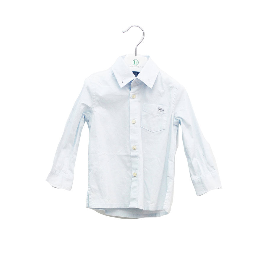 
  Shirt from the Silvian Heach Kids long-sleeved baby clothing line, button-down collar, solid c...