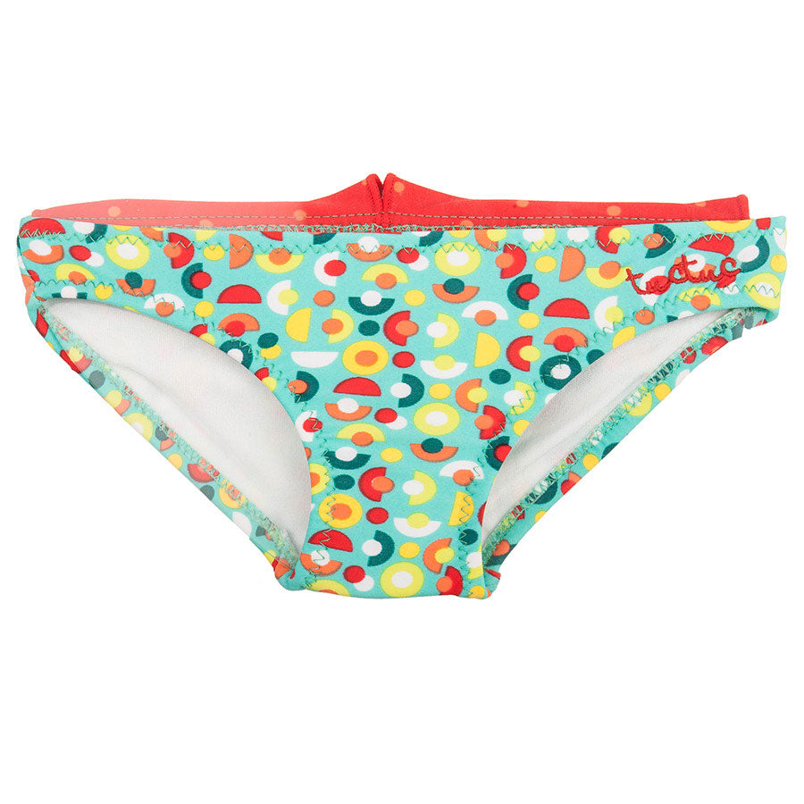 
  Briefs from the Tuc Tuc girl's clothing line with multicolor and curly fancy
  on the back.


...