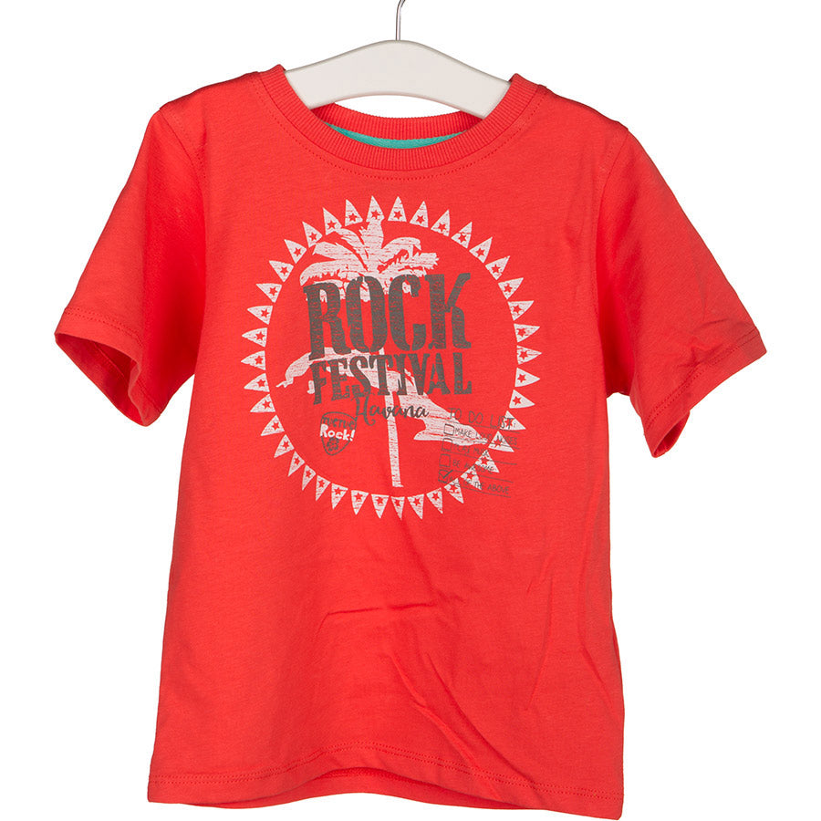 
  Tuc Tuc children's clothing line t-shirt with contrasting print on front
  colored on a red ba...