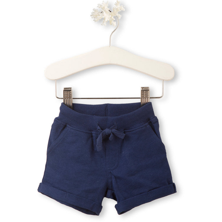
  Basic short from the Tuc Tuc children's clothing line, in solid color with pockets
  side and ...