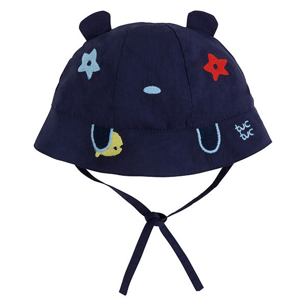 
  Cap from the Tuc Tuc girl's clothing line, with multicolor embroidery on the bottom
  blue and...