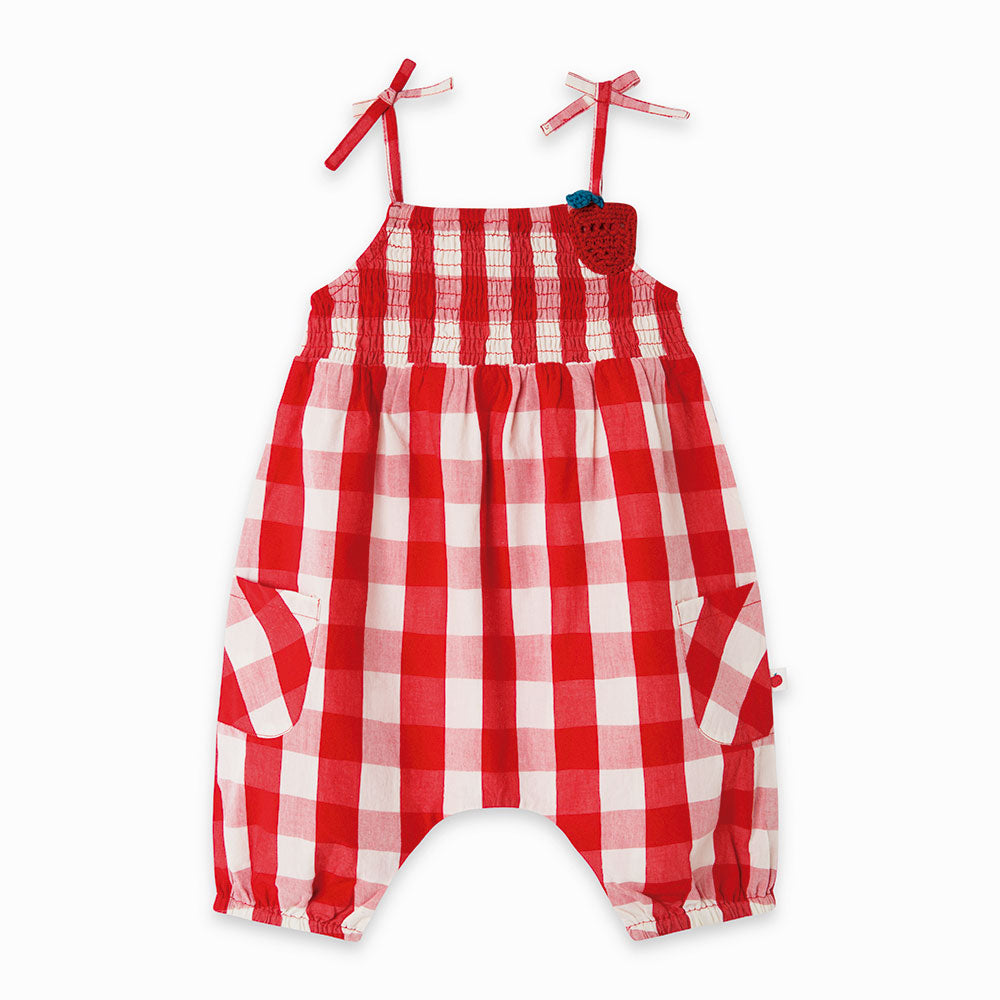 
  Jumpsuit from the tuc Tuc girl's clothing line with thin straps and smoke stitch
  at the top;...