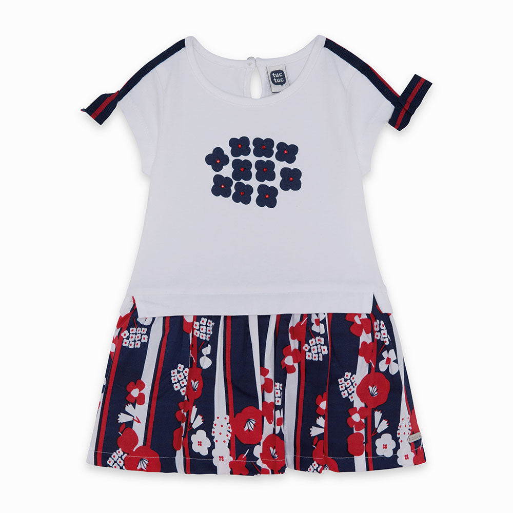 Dress from the Tuc Tuc Girl's Clothing Line with button on the back and bows on the sleeves. The ...