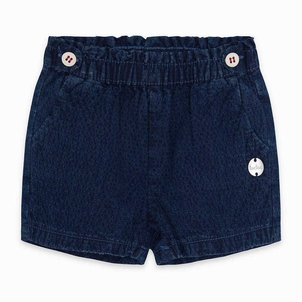 
  Denim shorts from the Tuc Tuc Girl's Clothing Line with side pockets
  and buttons on the fron...