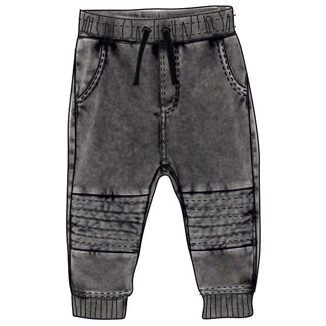 Plush trousers from the Tuc Tuc children's clothing line, with elasticated waist and ankle straps...