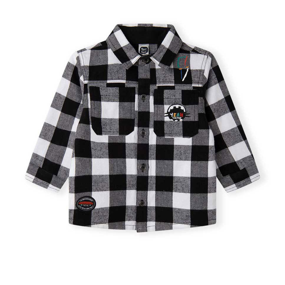 
Shirt from the Tuc Tuc Children's Clothing Line, in flannel with checked pattern. 

Composition:...